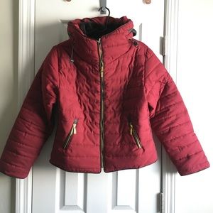 A Burgundy Puffer Jacket